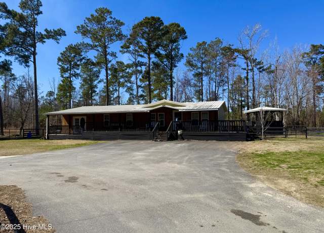 Property at 201 Deacon J W Griffin Blvd NW, Ash, NC 28420, 3 beds, 2 baths