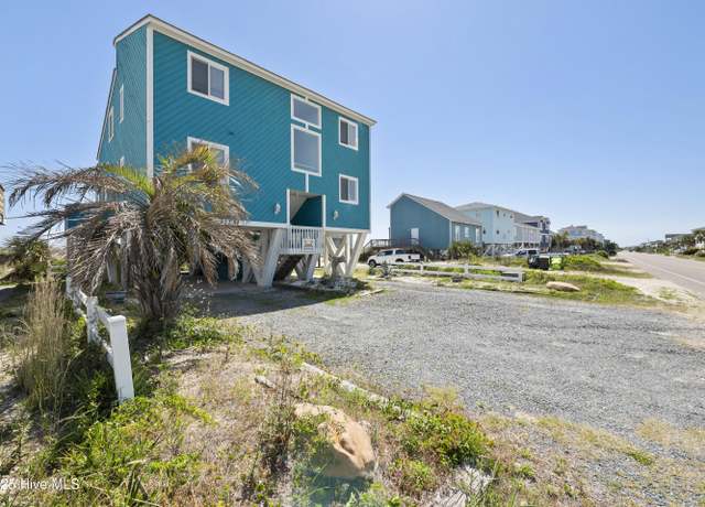 Property at 1123 E Beach Dr, Oak Island, NC 28465, 5 beds, 3 baths