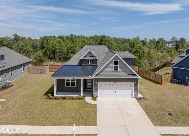 Property at 7053 Trailhead Rd, Leland, NC 28451, 4 beds, 3 baths