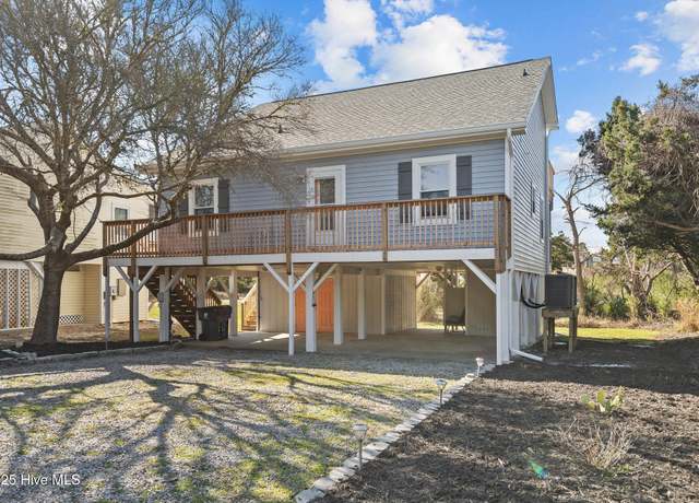 Property at 1923 E Pelican Dr, Oak Island, NC 28465, 4 beds, 2 baths