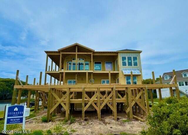 Property at 102 Ocean Dr, Oak Island, NC 28465, 7 beds, 7 baths