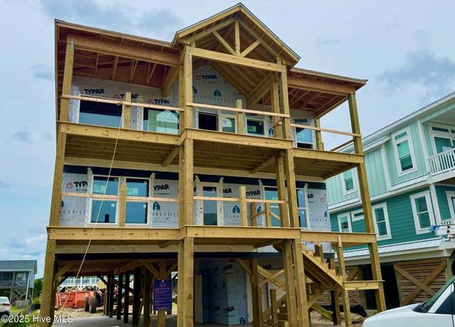 Property at 2916 E Beach Dr, Oak Island, NC 28465, 7 beds, 6.5 baths