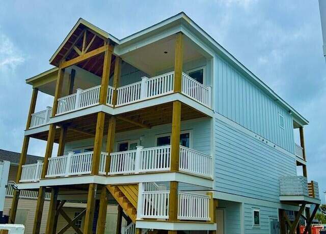 Property at 2916 E Beach Dr, Oak Island, NC 28465, 7 beds, 6.5 baths