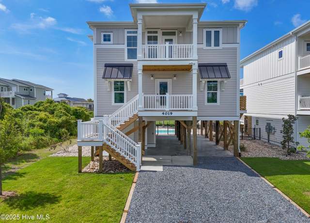 Property at 4019 E Pelican Dr, Oak Island, NC 28465, 4 beds, 4.5 baths