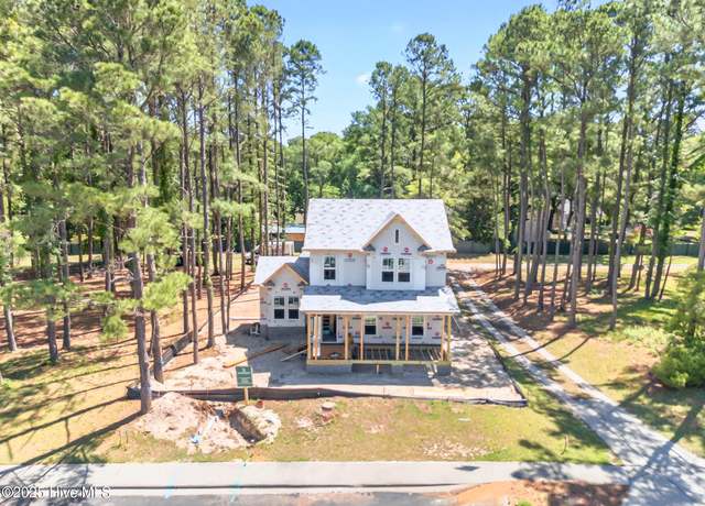 Property at 9148 E Lake Rd, Calabash, NC 28467, 4 beds, 3 baths