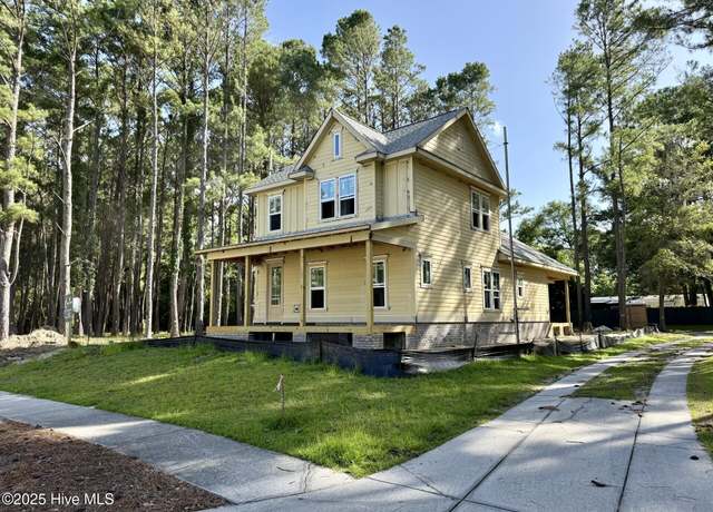 Property at 9148 E Lake Rd, Calabash, NC 28467, 4 beds, 3 baths