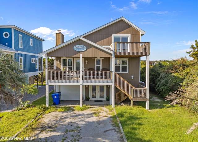 Property at 312 E Dolphin Dr, Oak Island, NC 28465, 3 beds, 2 baths