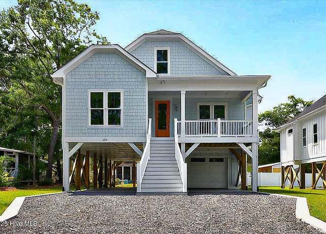 Property at 243 NE 70th St, Oak Island, NC 28465, 4 beds, 3 baths