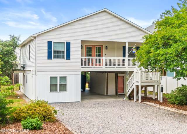 Property at 117 NE 52nd St, Oak Island, NC 28465, 5 beds, 3 baths