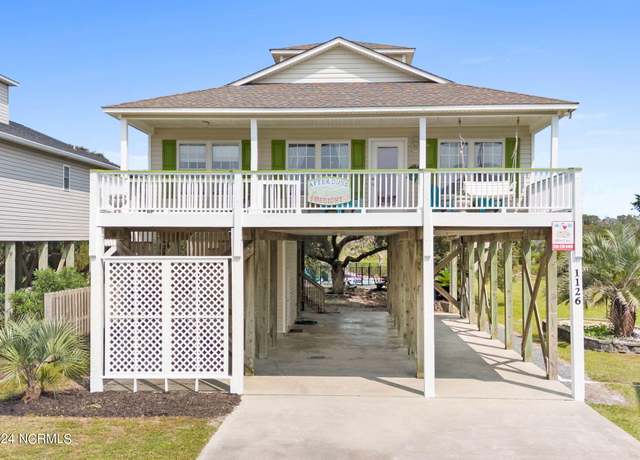 Property at 1126 E Dolphin Dr, Oak Island, NC 28465, 5 beds, 2 baths