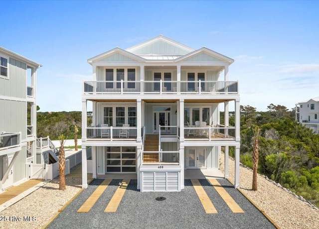 Property at 409 E Fourth St, Ocean Isle Beach, NC 28469, 5 beds, 5.5 baths