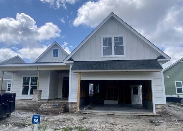 Property at 3377 Island Lakes Dr, Oak Island, NC 28461, 4 beds, 3 baths
