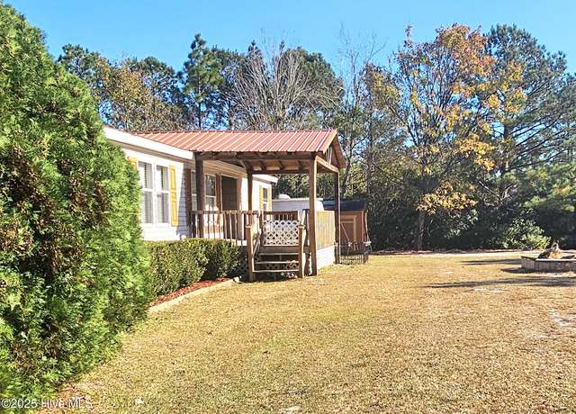 Property at 70 Buccaneer Blvd, Hampstead, NC 28443, 4 beds, 2 baths
