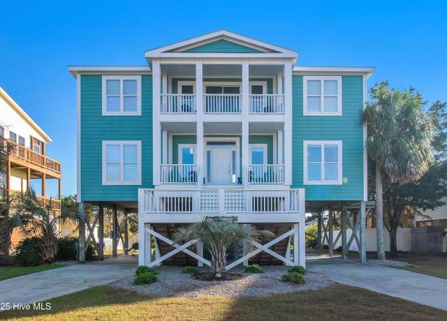 Property at 2911 E Pelican Dr, Oak Island, NC 28465, 5 beds, 3.5 baths
