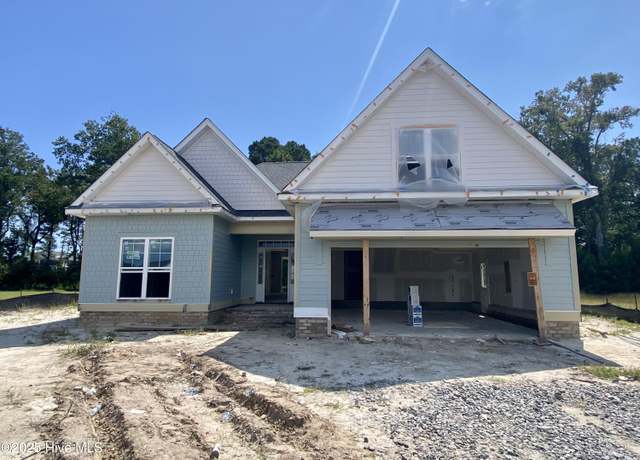Property at 3316 Island Lakes Dr, Oak Island, NC 28461, 4 beds, 3 baths