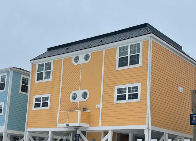 Property at 329 Ocean Blvd E, Holden Beach, NC 28462, 5 beds, 3.5 baths