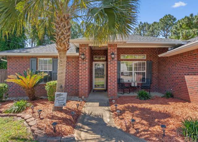 Property at 8239 Escola St, Navarre, FL 32566, 3 beds, 2 baths