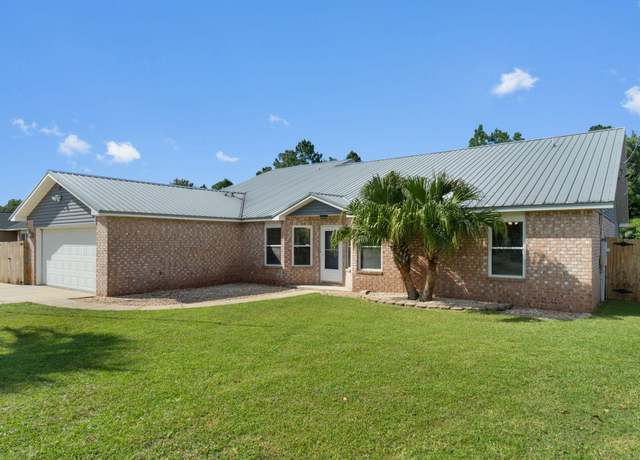 Property at 8154 Country Bay Blvd, Navarre, FL 32566, 4 beds, 2 baths