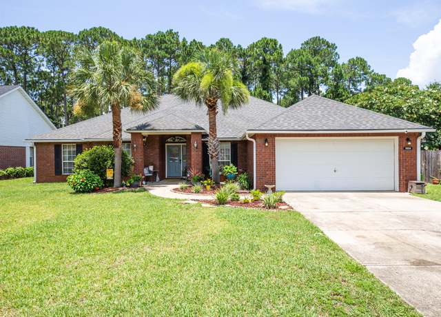 Property at 7034 Brighton Oaks Blvd, Navarre, FL 32566, 4 beds, 3 baths