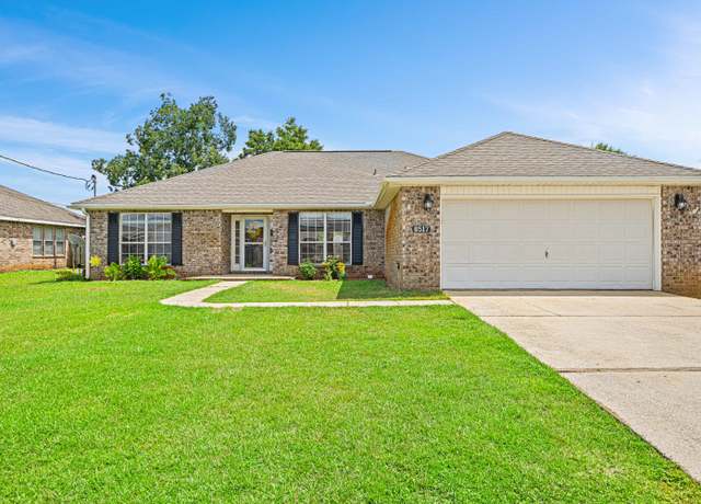 Property at 8517 High School Blvd, Navarre, FL 32566, 4 beds, 2 baths