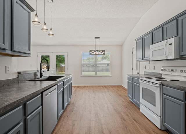 Property at 8517 High School Blvd, Navarre, FL 32566, 4 beds, 2 baths