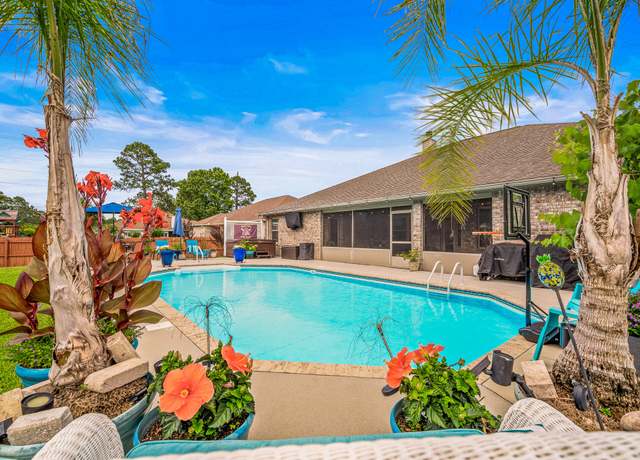 Property at 6564 Redfield St, Navarre, FL 32566, 5 beds, 3 baths