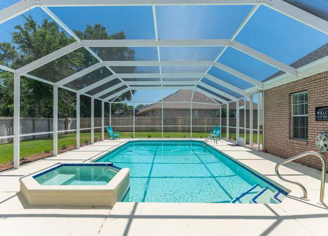 Property at 2840 Masters Blvd, Navarre, FL 32566, 3 beds, 2.5 baths