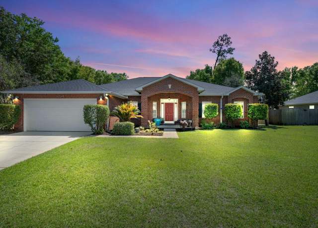 Property at 7281 Mossy Oaks Dr, Navarre, FL 32566, 4 beds, 2 baths