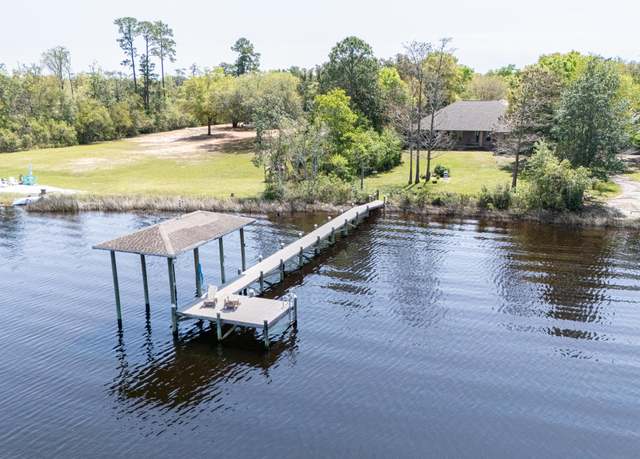 Property at 7696 Clarke St, Navarre, FL 32566, 4 beds, 3 baths