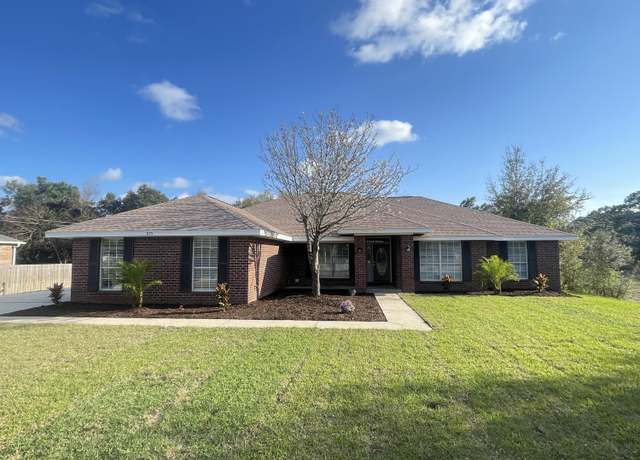 Property at 7175 Manatee St, Navarre, FL 32566, 4 beds, 2 baths