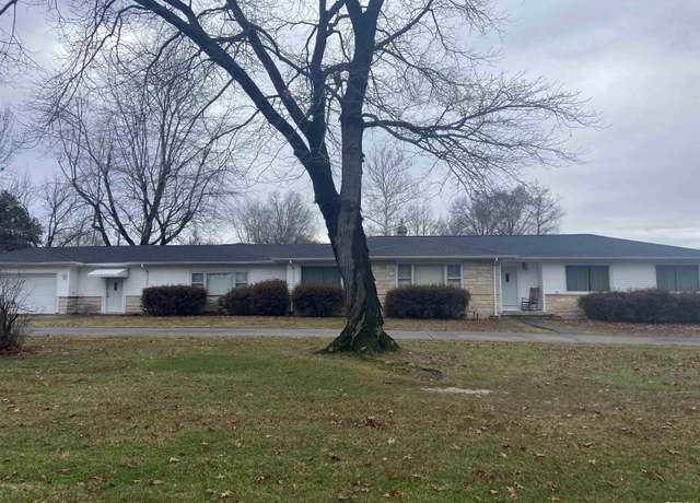 Property at 1401 W Grand Ave, Carterville, IL 62918, 4 beds, 2 baths