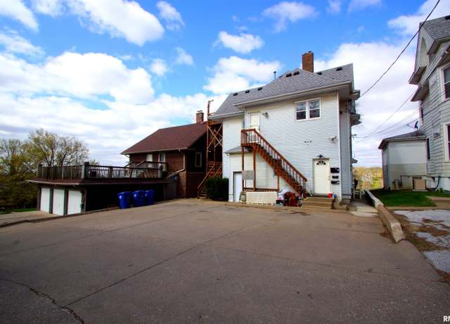 Property at 705 Brady St, Davenport, IA 52803, 7 beds, 3 baths