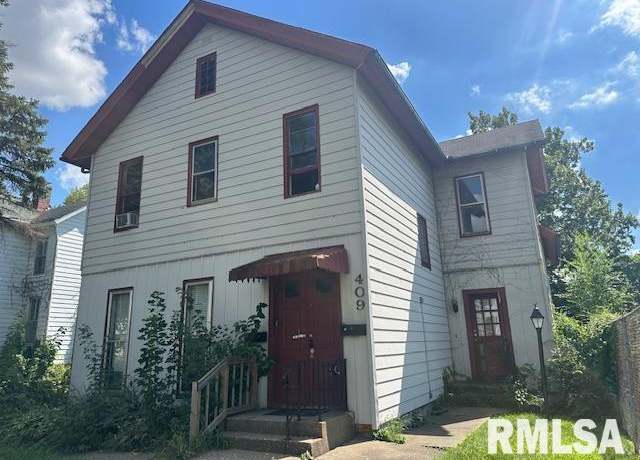 Property at 409 E 14th St, Davenport, IA 52803, 4 beds, 3 baths