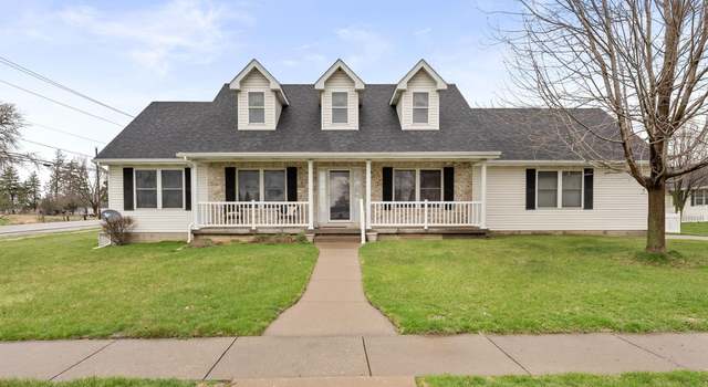 Photo of 102 E Dolan Dr, Blue Grass, IA 52726