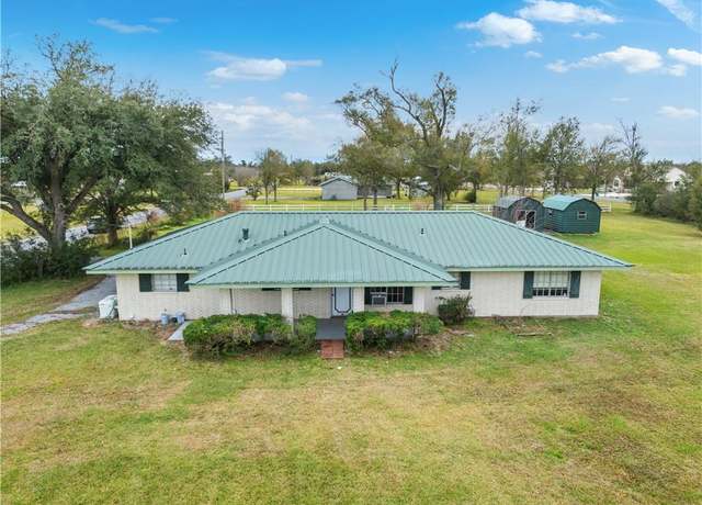 Property at 887 E Tank Farm Road Road, Lake Charles, LA 70607, 4 beds, 3 baths