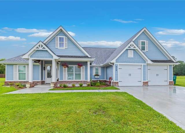 Property at 945 North Lake Court Court, Moss Bluff, LA 70611, 4 beds, 2.5 baths