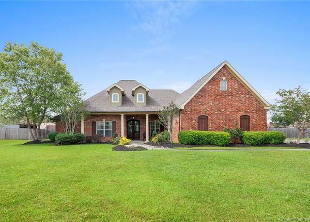 Property at 1696 S Woodland Forest Drive Drive, Lake Charles, LA 70611, 4 beds, 3.5 baths