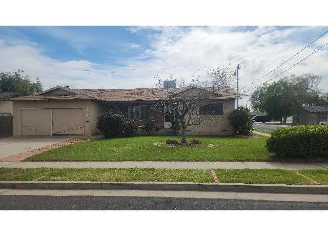 Property at 405 E Magnolia Ave, Hanford, CA 93230, 3 beds, 2 baths