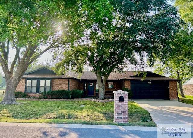 Property at 1001 Tesoro Ave, Rancho Viejo, TX 78575, 4 beds, 3 baths