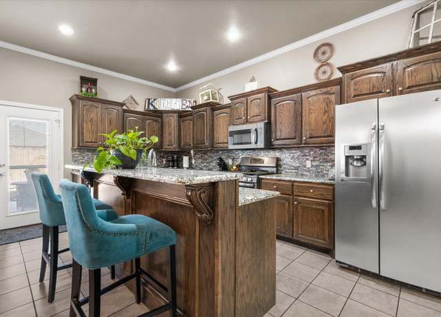 Property at 9614 La Salle Ave, Lubbock, TX 79424, 4 beds, 3 baths