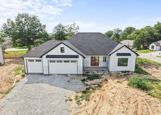 Property at 5201 Butter Cup Dr, Columbia, MO 65203, 5 beds, 3 baths