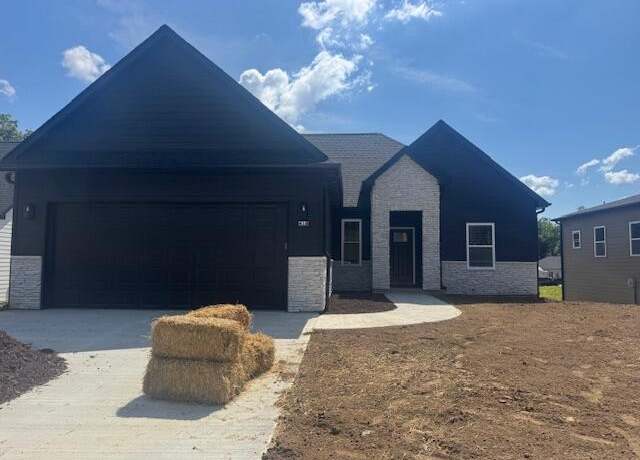 Property at 410 Sugarberry Dr, Columbia, MO 65201, 4 beds, 3 baths