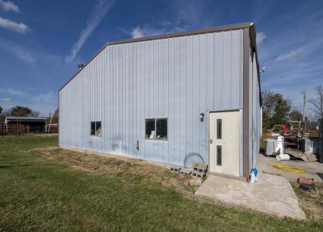 Property at 7000 W Sugar Creek Dr, Columbia, MO 65203, 4 beds, 2 baths