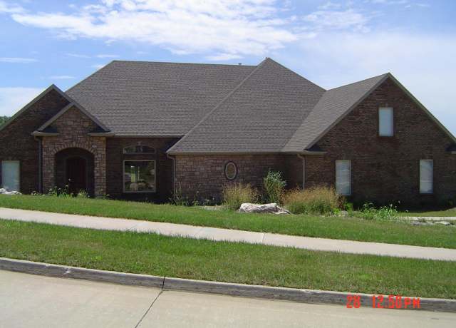 Property at 406 Tatlow Dr, Columbia, MO 65203, 4 beds, 3 baths