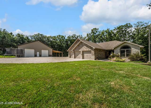 Property at 11169 Ridge Fork Dr, Holts Summit, MO 65043, 5 beds, 3 baths