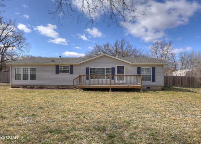 Property at 712 N Tennessee Ave, Carterville, MO 64835, 3 beds, 2 baths