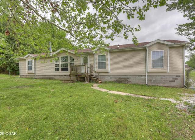 Property at 311 Miller St, Carl Junction, MO 64834, 4 beds, 2 baths