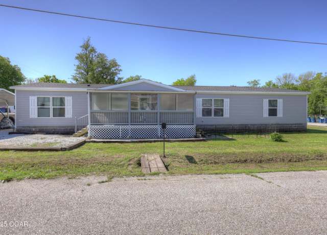 Property at 203 W Burch St St, Carterville, MO 64835, 4 beds, 2 baths