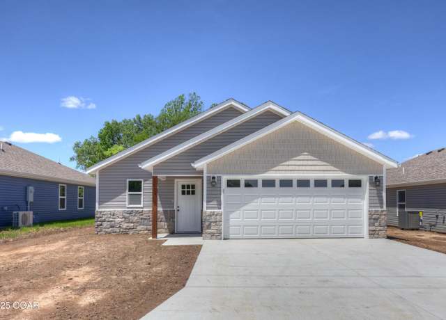 Property at 512 Harrison St, Carterville, MO 64835, 3 beds, 2 baths