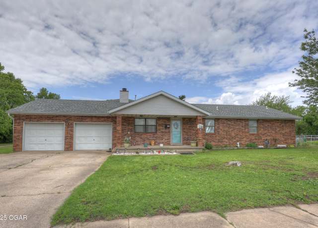 Property at 610 N Madison St, Webb City, MO 64870, 4 beds, 2 baths